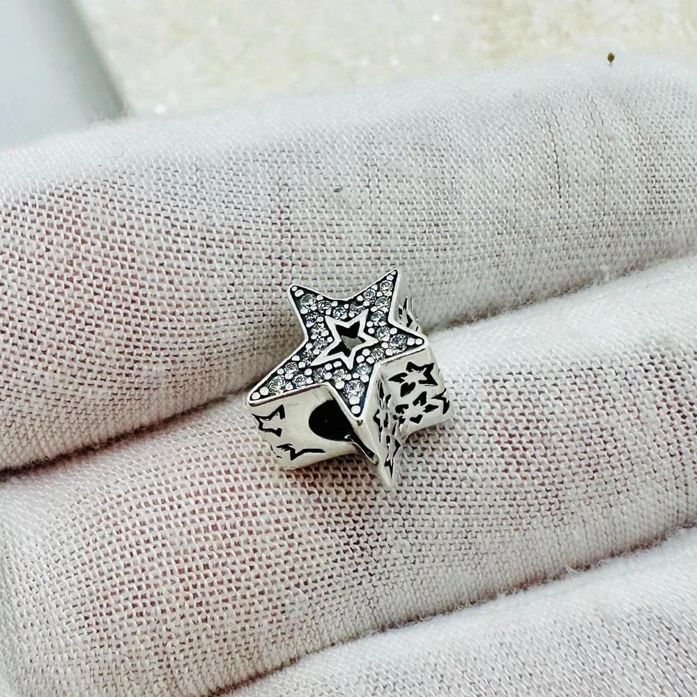 EUC Pandora 790016C01 Sterling Silver Asymmetric Star Charm w/ Clear CZ’s
